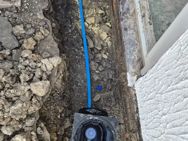 New MDPE supply pipe run into a boundary box at the property wall