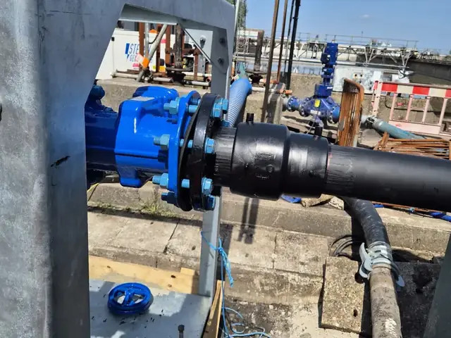 Large flanged gate valve on a water main at a plant site