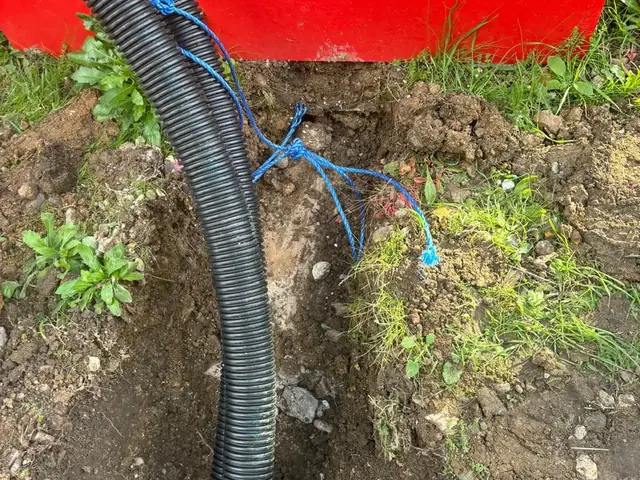 Cable ducting into a service trench at a Burger King drive-thru in Kent
