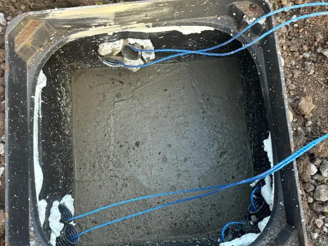 Draw ropes and duct entries in a new cable chamber — Burger King drive-thru