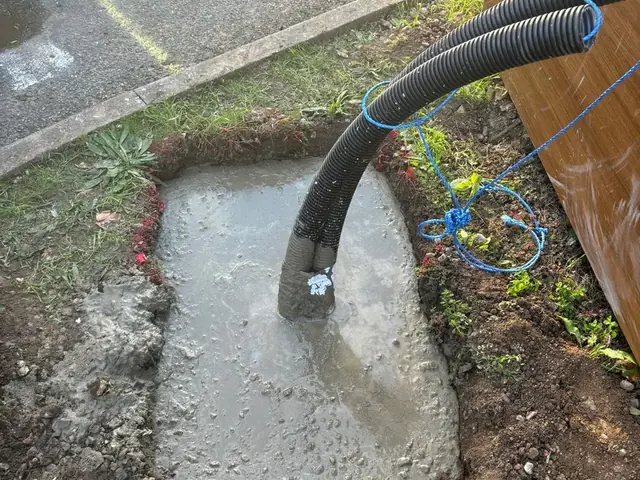 Cable duct bedded in concrete at a Burger King drive-thru in Kent