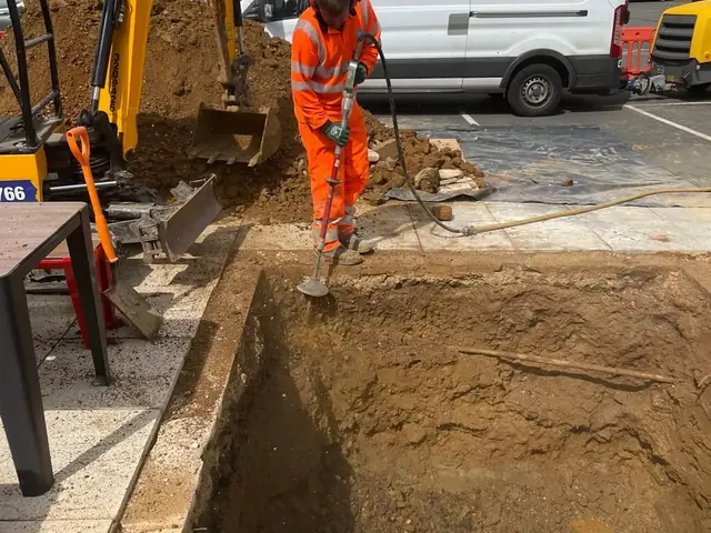 Excavating the footing for a new Burger King sign in Kent