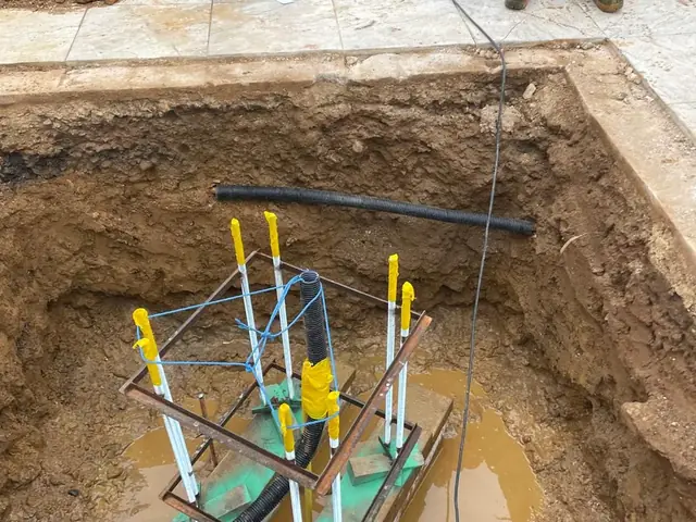 Steel holding-down cage set to level for a new Burger King sign