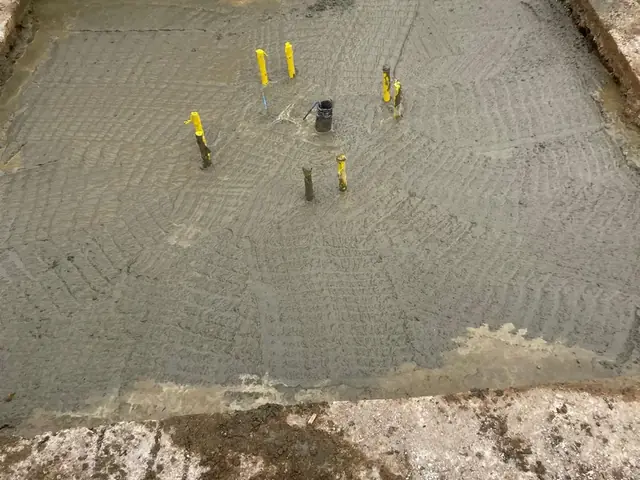 Sign footing poured with holding-down bolts set to level — Burger King, Kent