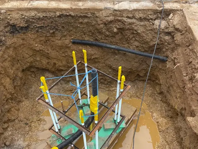 Sign-base cage braced and levelled in the excavation at a Burger King, Kent