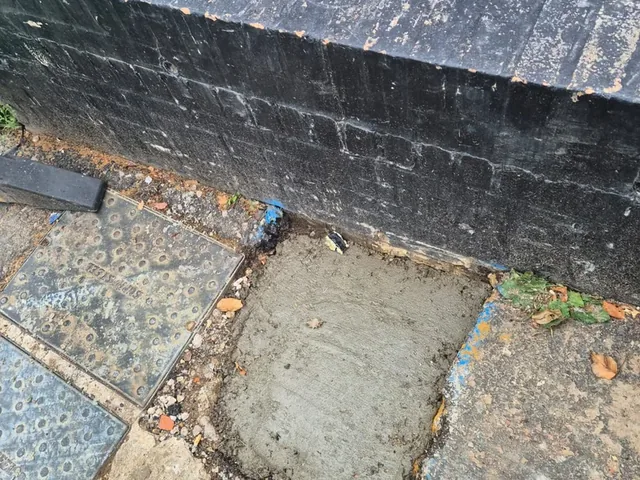 Concrete reinstatement completed flush with the existing footway after a supply pipe renewal