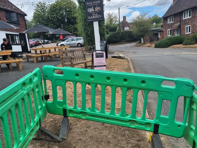 Barriered works area on the forecourt of The George, Trottiscliffe