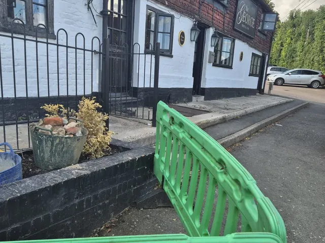 Supply pipe excavation alongside the frontage of a period village pub